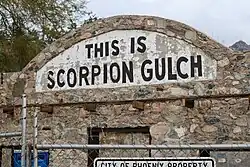 Scorpion Gulch sign taken during construction.