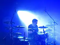 Moore performing with Manic Street Preachers in 2014