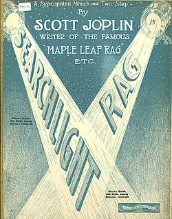 A stylized line drawing of searchlights shining their beams into a cross against a dark sky