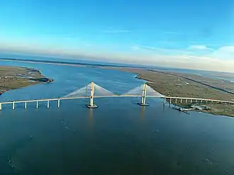 A color aerial photograph of a cable-stayed bridge