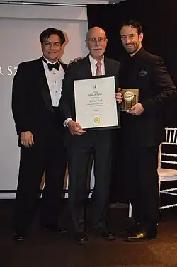 Irvin Ungar (center) accepting the Society of Illustrators' Hall of Fame award on behalf of artist Arthur Szyk in 2015