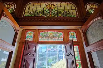 Stained glass windows above Antrim House's main entrance.