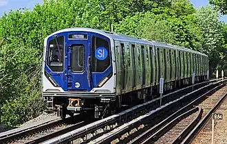 A Staten Island Railway R211S train arriving at the Jefferson Avenue station