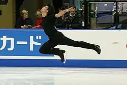Stephane Lambiel performs a stag jump.