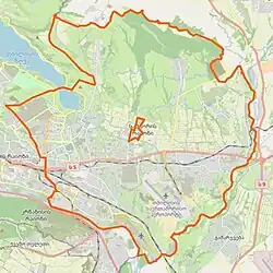 A map of the eastern part of Tbilisi. The Samgori District is outlined in a thick orange line. In the center of the district, a smaller area, the Tetrikhevhesi settlement, is also outlined in orange.