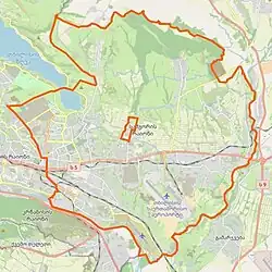 A map of the eastern part of Tbilisi. The Samgori District is outlined in a thick orange line. In the center of the district, a smaller area, the Tetrikhevi settlement, is also outlined in orange.