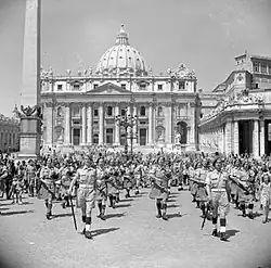 Image 44Musicians of the British Army's 38th (Irish) Brigade playing in front of St. Peter's Basilica in June 1944 (from Vatican City)
