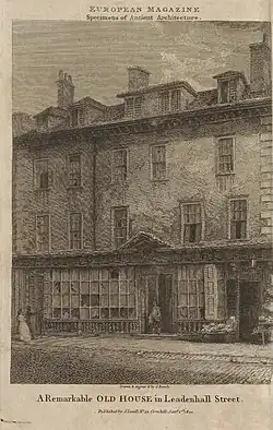 Etching of a dirty three story building with broken windows and cracked paintwork