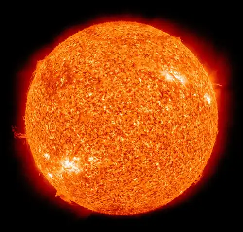Image 6 Sun Photograph credit: NASA/SDO The Sun is the star at the center of the Solar System. It is a nearly perfect sphere of plasma, heated by nuclear fusion of hydrogen into helium in its core, with internal convective motion that generates a magnetic field via a dynamo process. It is by far the most important source of energy for life on Earth. Its diameter is about 1.39 million kilometres (860,000 miles) or 109 times that of Earth, while its mass is about 330,000 times that of Earth. It accounts for about 99.86% of the total mass of the Solar System. Roughly three-quarters of the Sun's mass consists of hydrogen; the rest is mostly helium, with much smaller quantities of heavier elements, including oxygen, carbon, neon and iron. This false-color photograph of the Sun was taken by the Atmospheric Imaging Assembly instrument on NASA's Solar Dynamics Observatory (SDO) at a wavelength of 304 angstroms, in the extreme ultraviolet region of the electromagnetic spectrum. More selected pictures