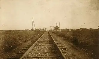Looking down the track towards some buildings