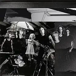 The above image shows 8 members of iNsuRge that played with the band for the longest periods. From Left to Right: Paul Bianco (percussion), Matt Richmond (drums), Mattieu Macroth (bass), Monique Wakelin (sampler, vocals), Chris Dubrow (guitar, vocals), Darryl Sims (drums), Sean Burnett (percussion), Mark Avery (bass).