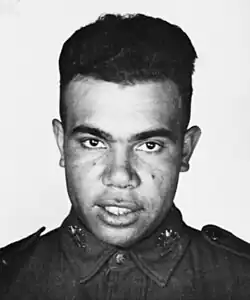 Enlistment photograph of Tim Hughes in 1939