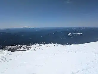 The ski area viewed from its highest point skier's left of the Palmer lift, with the Timberline base area in the center and Mount Hood Skibowl off to the right