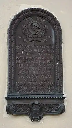 1921 historical marker dedicating the Gabaldon building inside the Tomas Claudio Memorial Elementary School in Claudio's honor