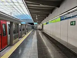 One of the station's platforms in 2025, with the platform screen doors and the skylight visible