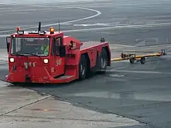 Pushback tug with the towbar behind