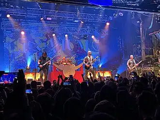 Trivium performing in Barcelona in 2023. From left to right: Corey Beaulieu, Alex Bent, Matt Heafy and Paolo Gregoletto
