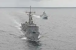 USS Rodney M. Davis alongside KDB Darulaman during CARAT 2014.