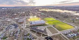 The complex lit up in the evening
