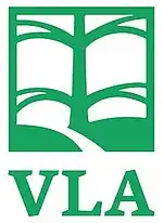 a sort of a green tree/book image with the letters V L A on it