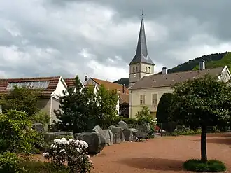 The church and surroundings in Le Val-d'Ajol