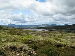 View towards Loch Hoil Looking down from the track towards Loch Hoil, with Schiehallion on the skyline to the left.