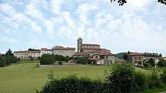 The church and surrounding buildings in La Chapelle-sur-Coise