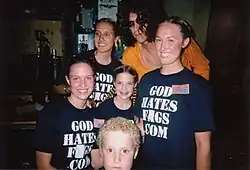 Members of the Westboro Baptist Church posing with Howard Stern at their appearance on his show.