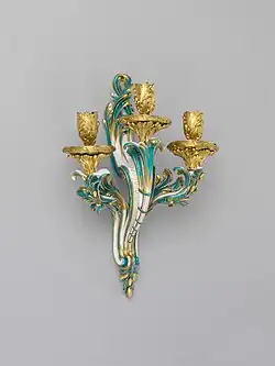 Rococo – wall sconce (bras de cheminée), by the Sèvres porcelain factory, c. 1761, soft-paste porcelain and gilt bronze, Metropolitan Museum of Art
