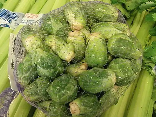 Brussels sprouts removed from the stalk and placed in a net-type bag