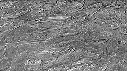 Crommelin crater showing layers arranged in the shape of ovals, as seen by CTX camera. Note: this is an enlargement of a previous image.