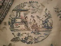 Detail of the central embroidery work of a woman's summer robe, silk gauze, c. 1875–1900, Qing dynasty. On display at the Asian Art Museum of San Francisco.