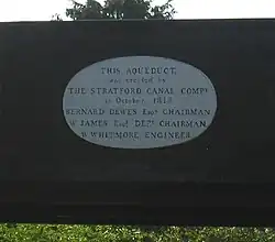 Plaque attached to non-towpath (south) side of trough