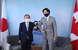 Yoshihide Suga with Canadian Prime Minister Justin Trudeau in June 2021