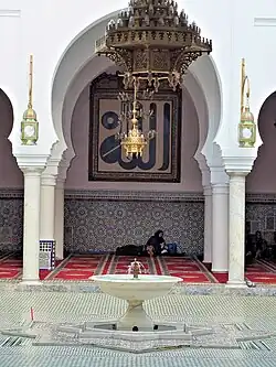 A composition of the name Allah by al-Qundusi displayed at the Zawiya of Moulay Idris II in Fes.