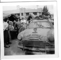 The trial in Alice Springs with the Riverside Hotel (now Todd Tavern) in the background, July 1956