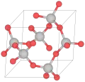 Estructura cristalina del α-cuarzo (las bolas rojas son de oxígeno y las grises de silicio)