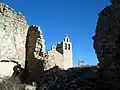 Vista de la iglesia de Santa María en Moya (Cuenca), desde el solar de la iglesia de la Trinidad, antes de su restauración.