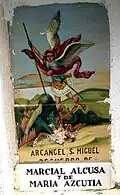 Detalle de ladrillo cerámico con la representación del Arcángel san Miguel en Puebla de San Miguel (Valencia), año 2004.