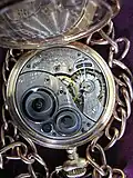 Movimiento de un reloj de bolsillo Elgin, hacia 1919, número de serie 21 667 498.