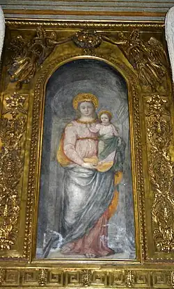 La Madonna della Scala, fresco de autor anónimo del XV proveniente de la iglesia destruiída de Santa Maria alla Scala, conservado en la iglesia San Fedele de Milan.