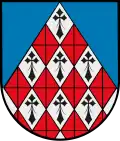 Cortinado Losanjado de gules y plata hecho de arniño, y campo de azur