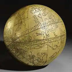 Un gran globo celeste persa de latón, grabado con marcas, figuras y símbolos astrológicos y detalles inscriptivos en todas partes, con una adscripción a Hadi Isfahani y una fecha de 1197.