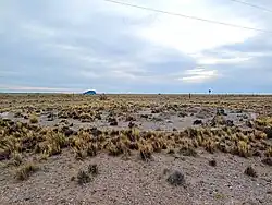 Lugar que contenía una aguada o tanque para el ganado.