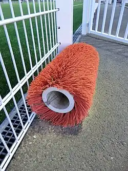 Cepillo giratorio para zapatos