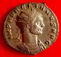 Moneda con el rostro de Aureliano.