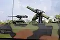 BGM-71 TOW y ametralladora M2 en CM-25
