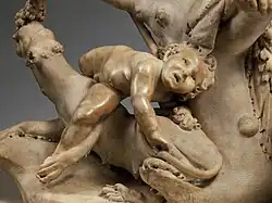 Detalle de un cupido