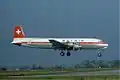 Douglas DC-6 de Balair en el aeropuerto de Basilea (1976)