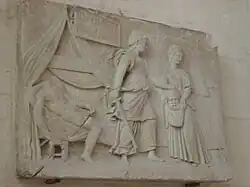 Bajorrelieve de finales del siglo&nbsp;XVI o inicios del XVII que representan a Judith que viene de decapitar a Holofernes.